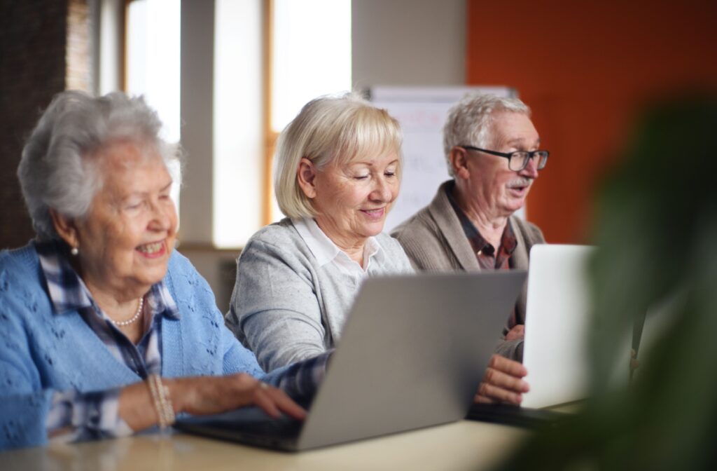 Senior Group in Retirement Facility Taking a Computer Class